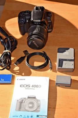 Canon EOS 400D Kit+Canon EF-S 18-55mm 1:3.5-5.6 II Zubehörpaket - Bild 1 von 4
