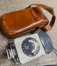 Vintage SAMOCA Camera Flash Bulb Reflector Fan, Case, Made in Japan Photograph