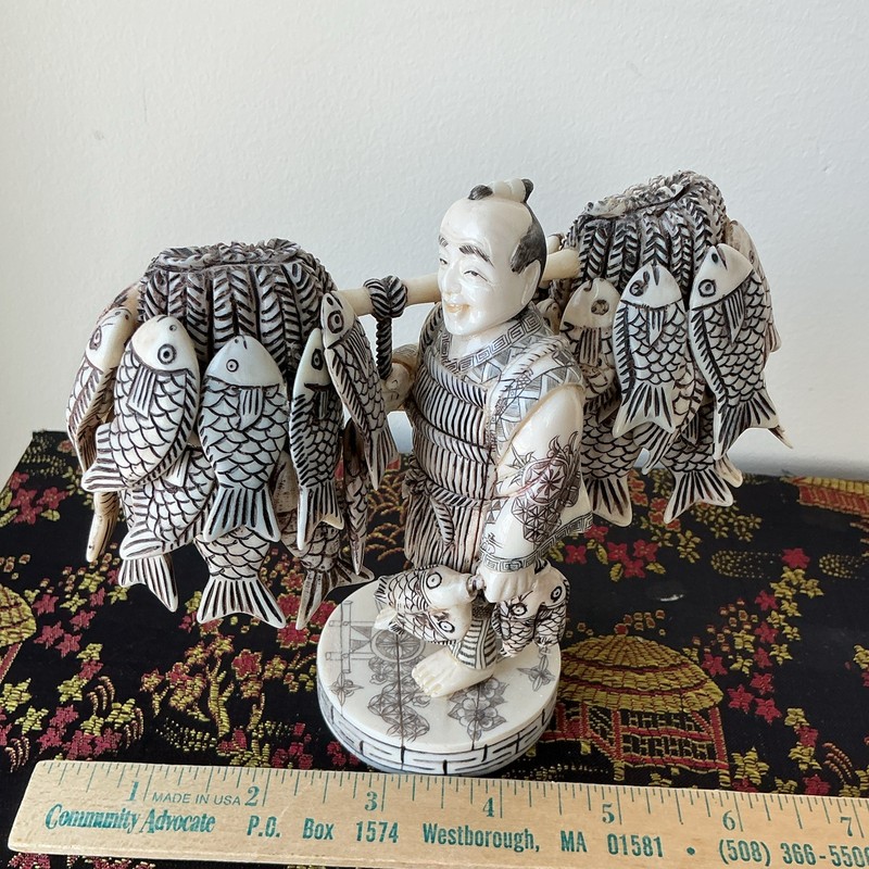 Hand Carved Ivory color Fisherman Figurine Carrying Fish Pole Ivory Black 6 in