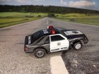 TYCO Highway Patrol with Lights & Sirens Mustang Uturn Chassis Runs Great  — photo 9