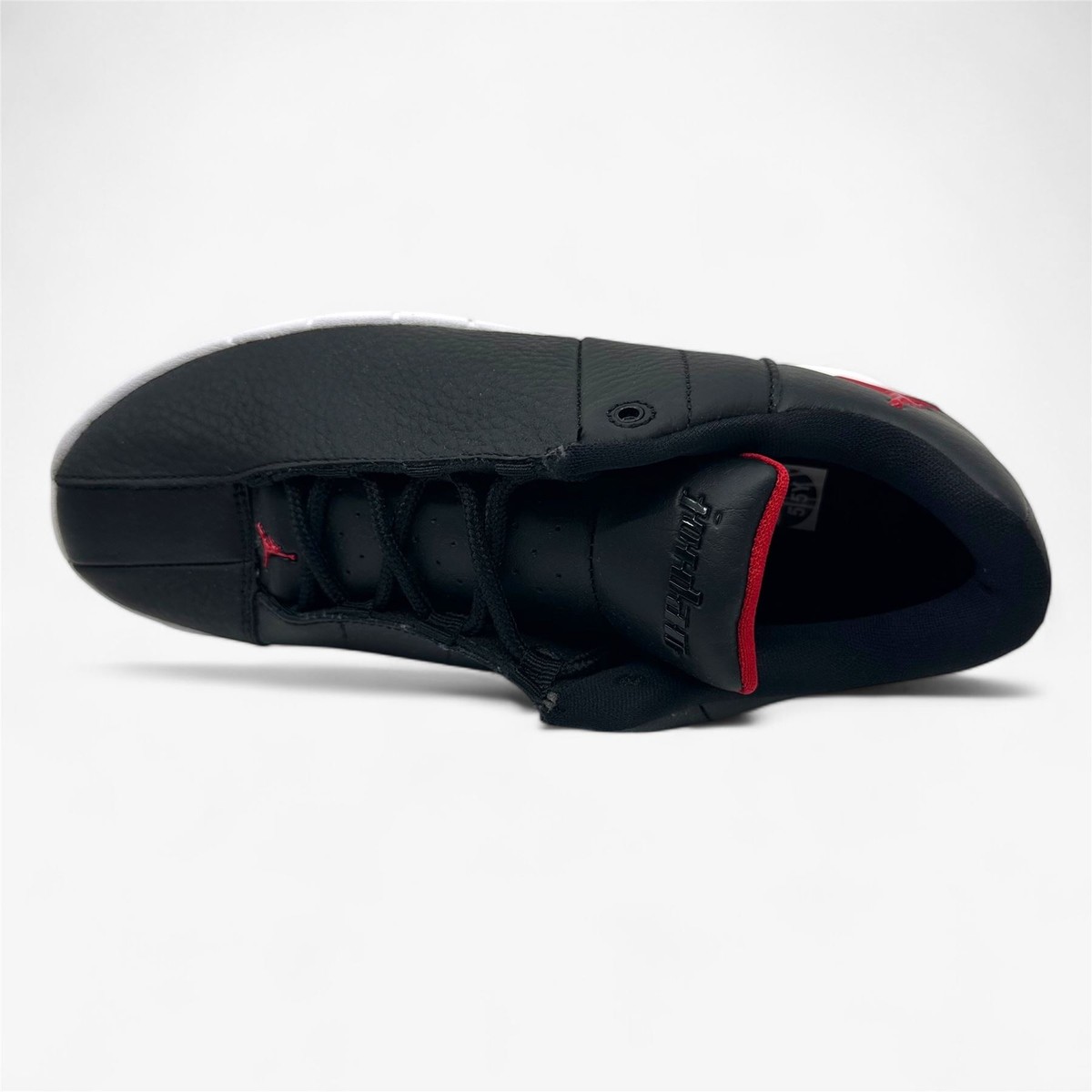 Jordan TE Low GS Black Gym Red White Kids Athletic Sneaker - Main Image