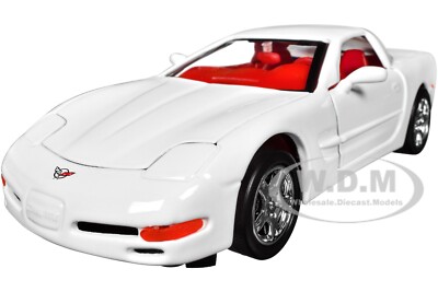 1997 CHEVROLET CORVETTE C5 WHITE W/RED INTERIOR 1/24 DIECAST CAR
