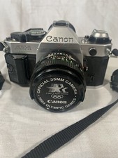 Canon AE-1 SLR Film Camera With Vivatar Flash And Lens Cleaning Kit - Black