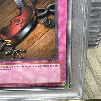 2003 YuGiOh 1st Edition Seven Tools Of The Bandit #045 PSA 7 NM