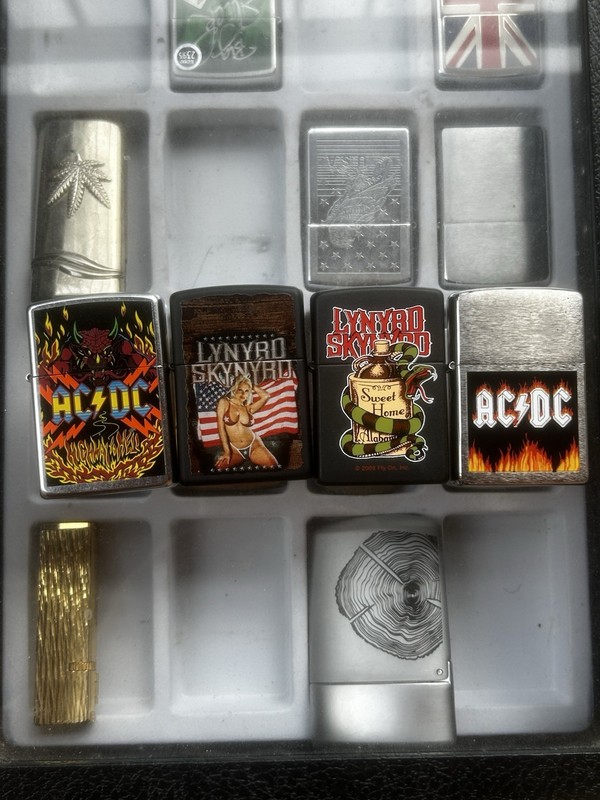 Lot of 32 Collectible Lighters with Display Cases, AC/DC & Lynyrd Skynyrd