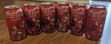 Coca Cola Cans. Christmas Vintage from 1996. Set Of Six. Santa Inspired/ Holiday