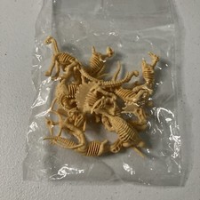 Dinosaur Skeleton Figurines Plastic Pack Of 12 T-Rex Jurassic Pterodactyl Dino