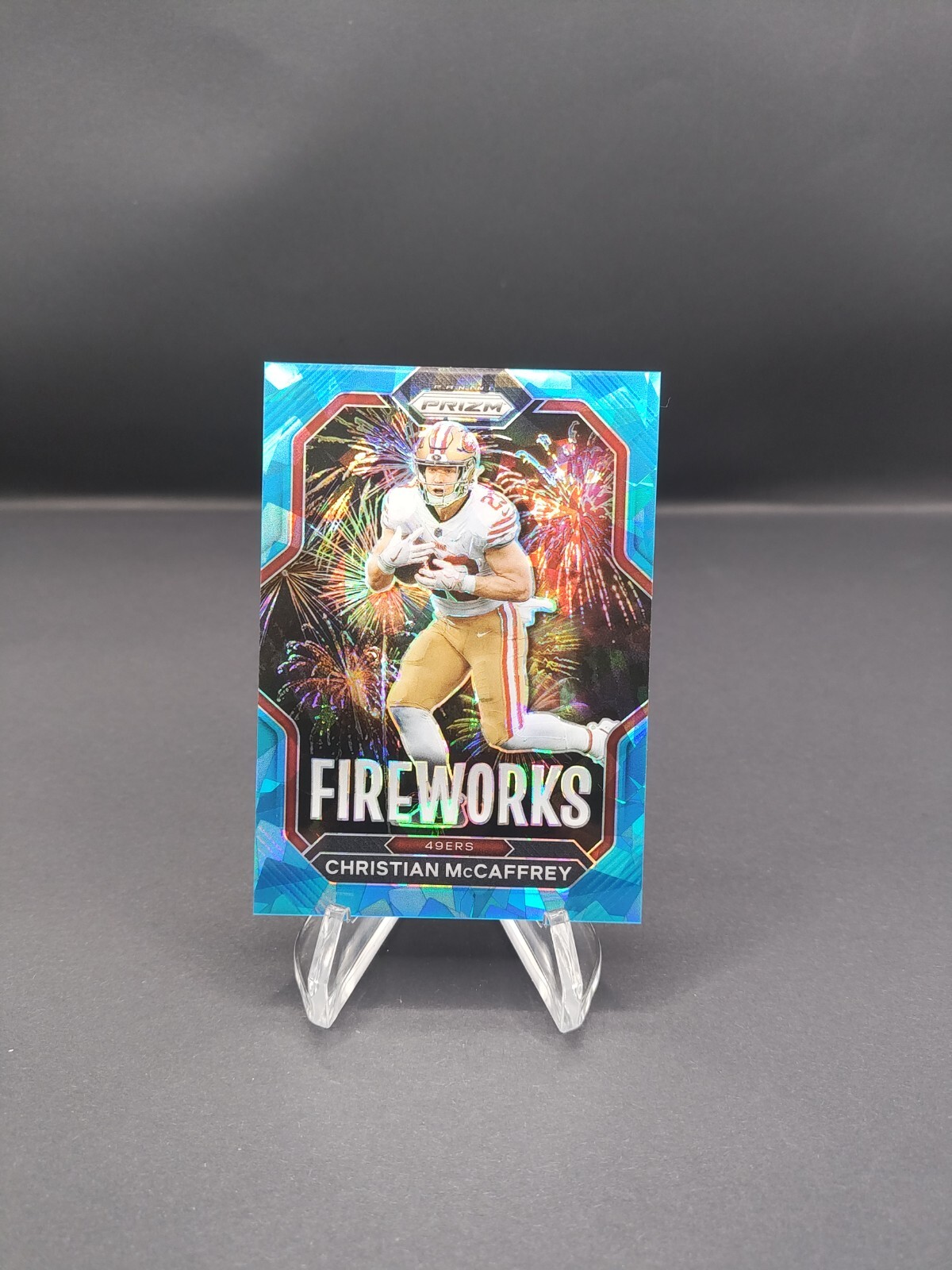 2022 Panini Prizm - Fireworks Blue Ice Prizm #F-10 Christian McCaffrey 19/99