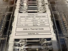 Quantity of 23 WaferNet Inc. 300mm 3000A TOx wafers with ship case
