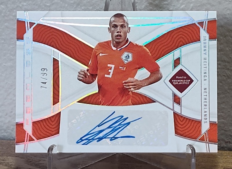 2022 National Treasures Road to FIFA World Cup /99 John Heitinga Auto 1o5o