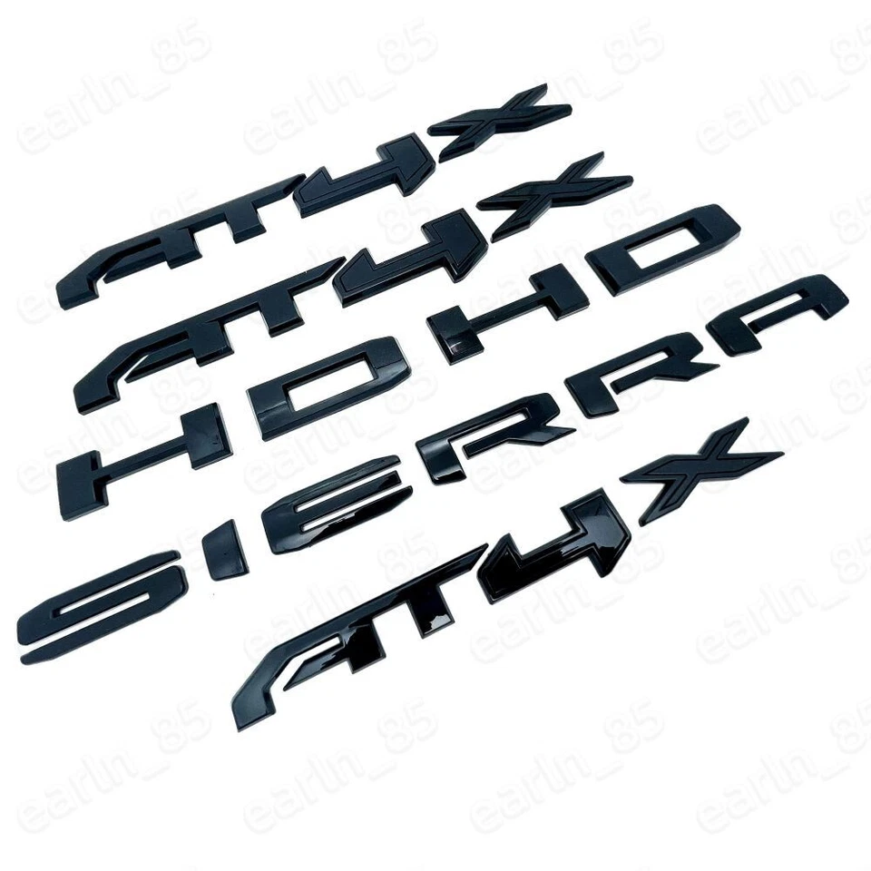 GMC Sierra 2500HD 3500HD Sierra HD AT4X 2023-2025 Kit de insignias emblema negro Foto 3 de 4
