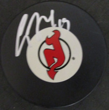 TRAVIS ZAJAC SIGNED NEW JERSEY DEVILS HOCKEY PUCK w/ COA