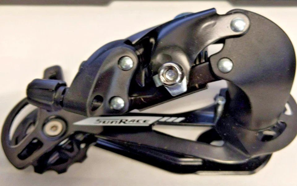 Desviador trasero original SunRace M57 8S, 11-34T, jaula larga, directo 100x170x89 Foto 4 de 4