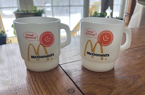 2 VINTAGE MCDONALDS ANCHOR HOCKING FIRE KING MILK GLASS GOOD MORNING COFFEE MUGS