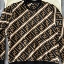 Stylish Fendi sweater with bold geometric pattern in black and brown tones.