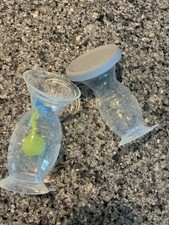 Haakaa breast pumps with suction bases and covers