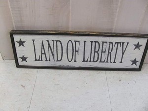 Country Land Of Liberty White Background Black Letters Wooden Sign