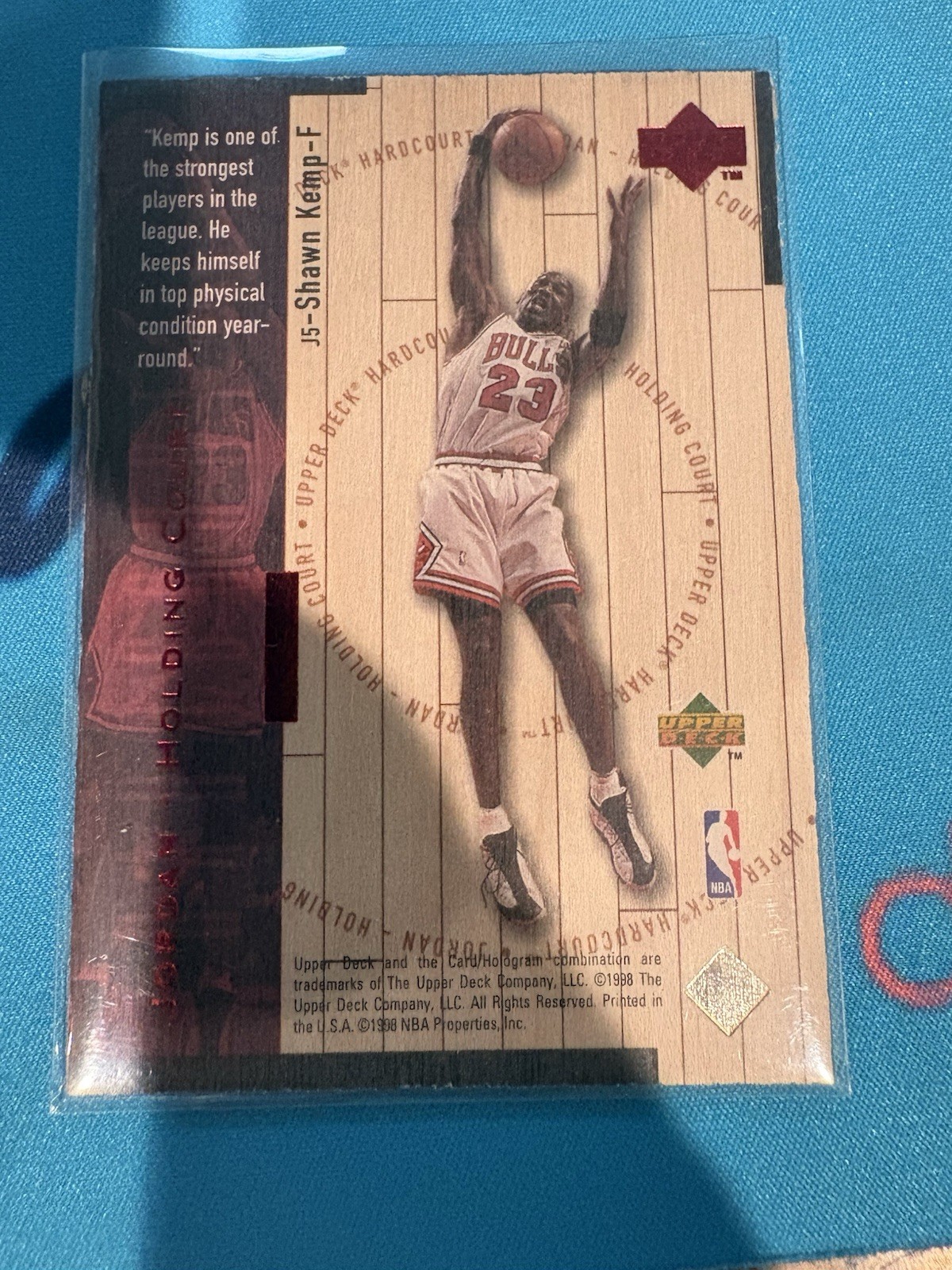 1998 NBA HARDCOURT JORDAN HOLDING COURT SHAWN KEMP  MICHAEL JORDAN 0782/2300 #J5