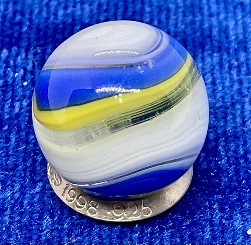 A Vintage Akro Agate Yellow And Blue Popeye Marble. It Measures .64” , Mint.