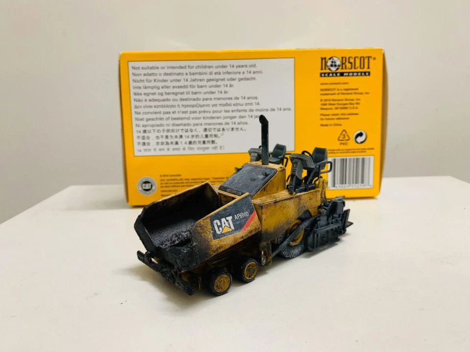 Norscot Cat AP600D Asphalt Paver Muddy Edition 1:50 Scale DieCast Model 55259 - Image 2 of 4