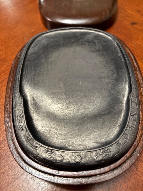 Vintage Chinese Ink Stone. Measures 5” x 7”. Wooden case in excellent condition.