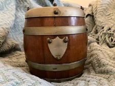 Vintage round barrel cigar humidor.  Wood and metal.