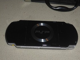 BLACK SONY PLAYSTATION PORTABLE PSP-2001 SYSTEM W EARBUDS CHARGER HARD CASE