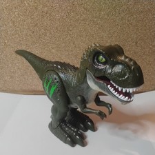 Robo Alive 10" Attacking T-Rex Dinosaur Battery-Powered Robotic Toy by Zuru Inc