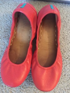 red leather ballet pumps