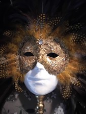 Two vintage Venetian masks