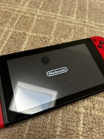 Nintendo Switch 32GB Gray Console with Mario Red Joy-Con And 128Gb Card