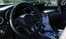 Cubierta de volante de costura manual con aguja apta para accesorios de coche de cuatro estaciones