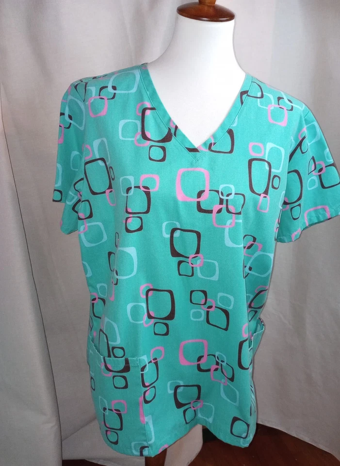 Top exfoliante geométrico turquesa talla L de SB Scrubs medidas de la vida real a continuación Foto 4 de 4