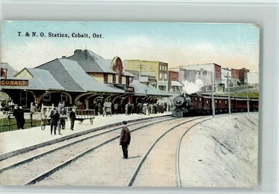13031444 - T. & N.O. Station. Cobalt, Ont. Railway runs to station 1924