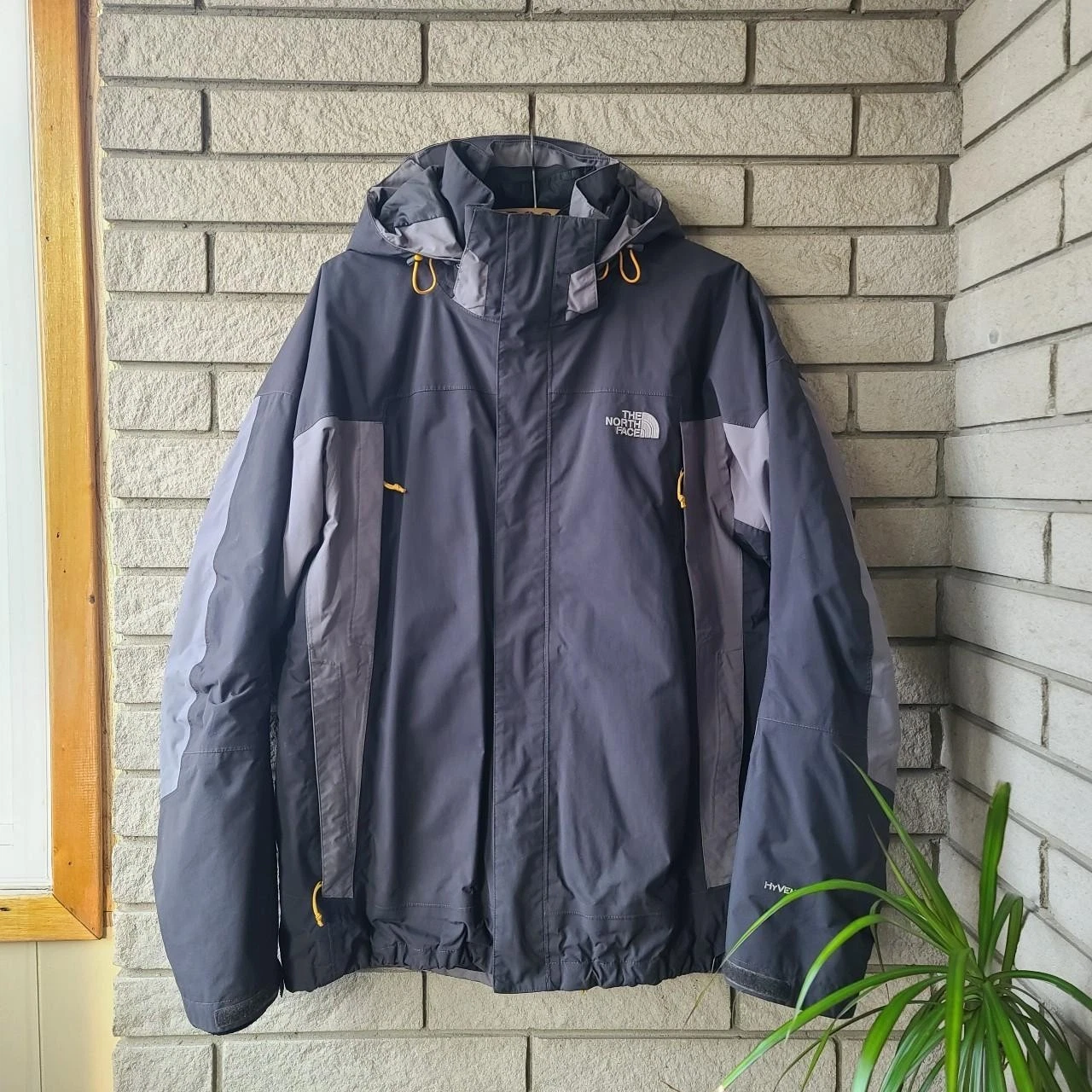 2 piece 'The North Face' grey waterproof jacket with separate black liner jacket