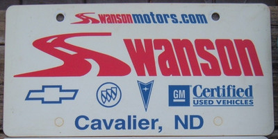 Dealer License Plate plastic Swanson Chevy Buick Pontiac GM Cavalier ND