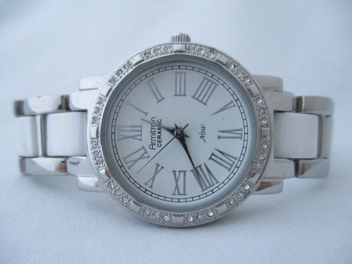 Armitron Ceramic Ladies Analog Watch Silver Toned White Armitron Ceramic Ladies Analog Watch Silver Toned White