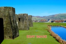PHOTO  CAERPHILLY CASTLE . THE CURTAIN WALL ON THE EAST SIDE OF THE BIGGEST CAST