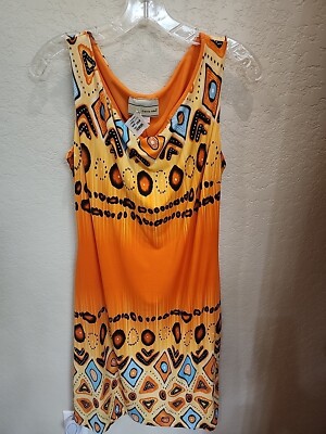 carrie orange dress All the Outfits From the 'And Just Like That ' Finale