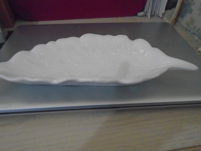 White ceramic leaf dish made in Japan 12''x5'' One flea bite, hard to see.