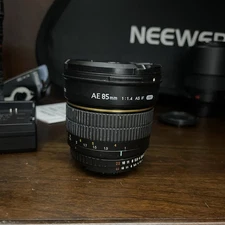 Rokinon AE 85mm f/1.4 AS IF UMC lens Nikon AIS mount, ugly but it works.
