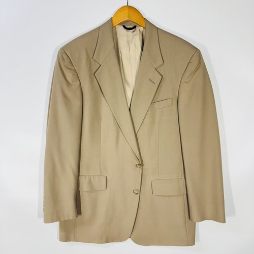 Ivory gold men's blazer with notch lapels, two-button front, and "Austin Reed Men's Sport Coat USA Made" label.