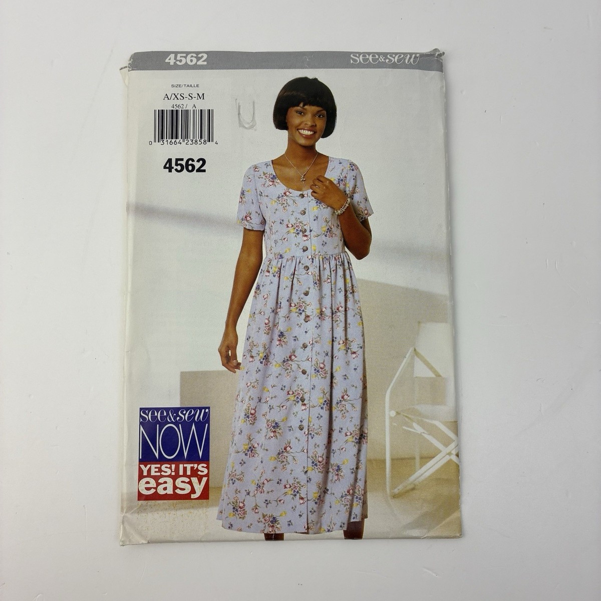 dress with fitted top and flared skirt Strapless Fitted Mini Dress With Flared Skirt And Draping Scarf Attachment