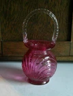 Fenton art glass basket cranberry swirl with clear handle