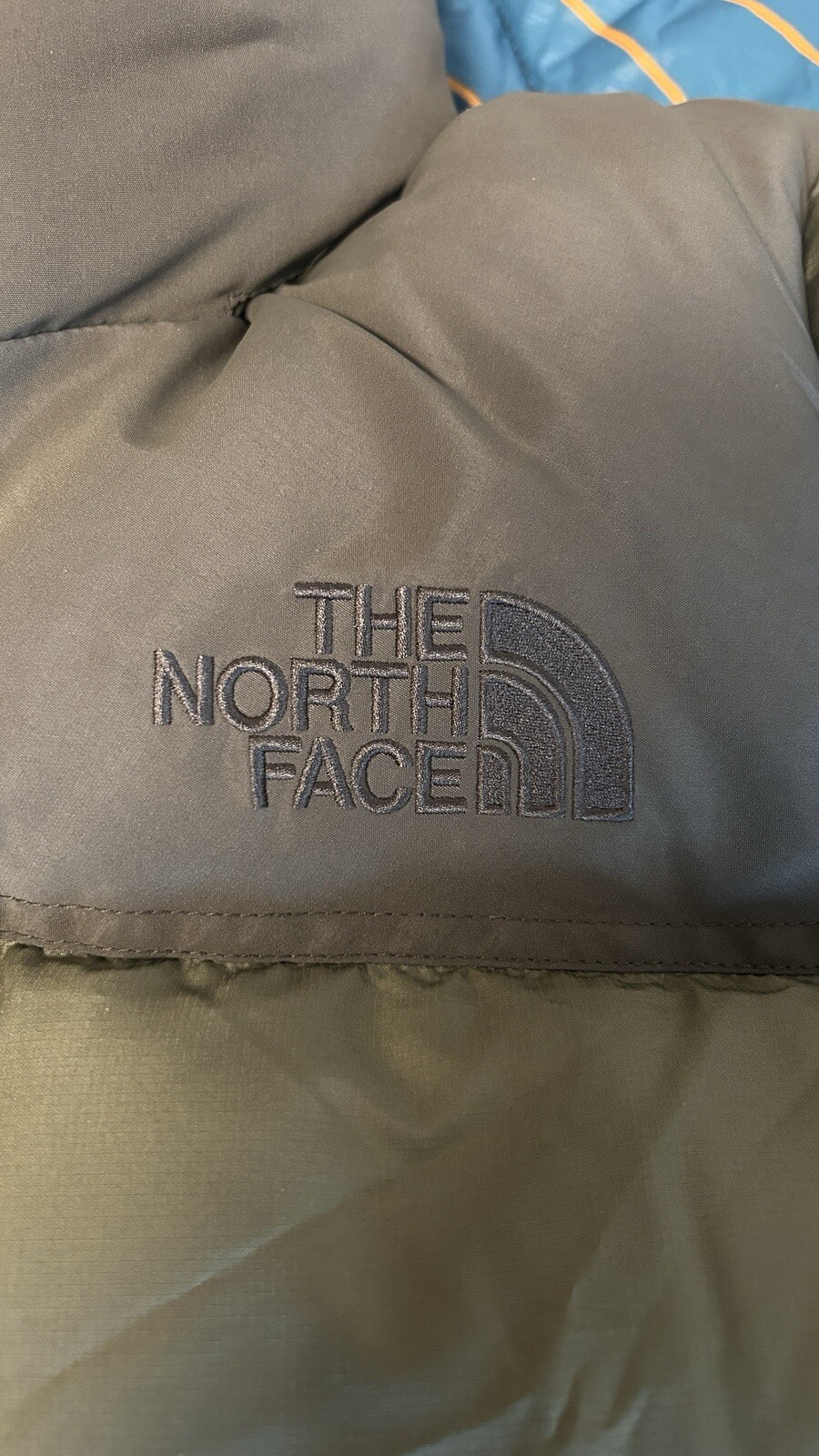 North Face mens insulated puffer jacket for cold weather