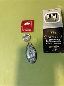 Vintage Travelers Insurance lot:  Key tag, matchbook and car pool token