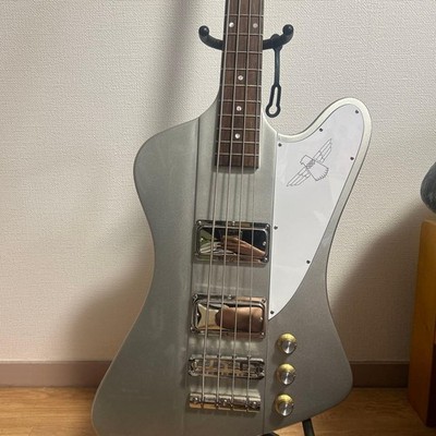Silberne E-Bassgitarre, Thunderbird Style, 2 Tonabnehmer, Palisander Hals