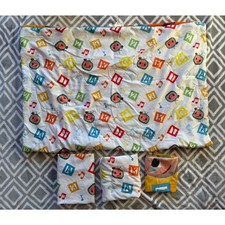 Cocomelon 4 Piece Toddler Bedding Set with Reversible Comforter