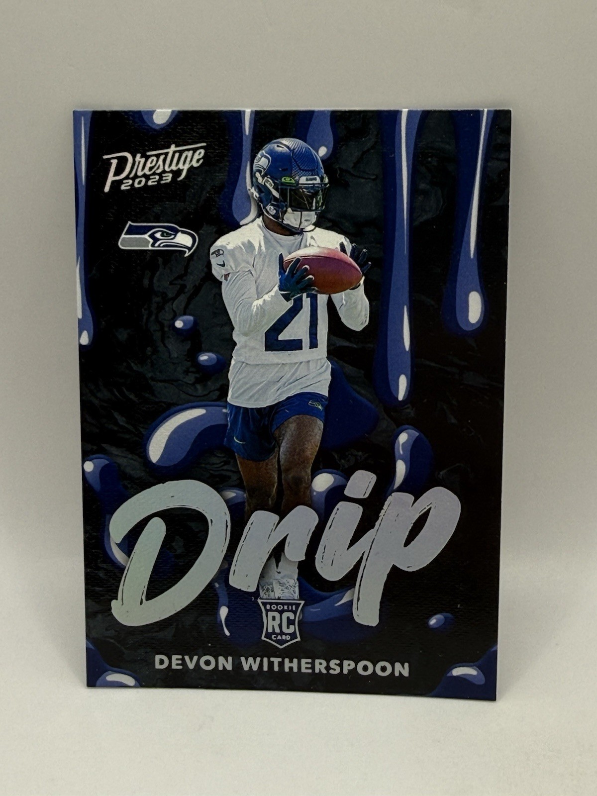 DA106593 2023 Prestige NFL Drip #5 Devon Witherspoon RC