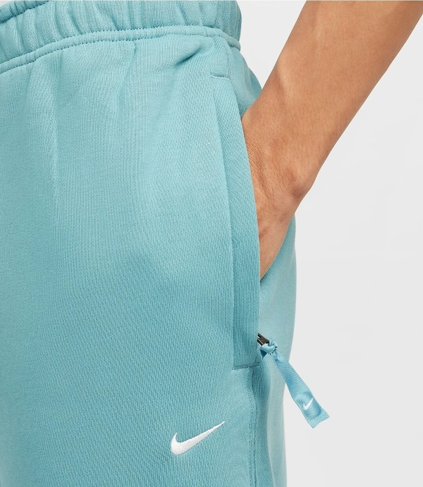 Pantalones de vellón Nike Solo Swoosh talla GRANDE agua turquesa blanco para hombre DX1364 440 Foto 3 de 4